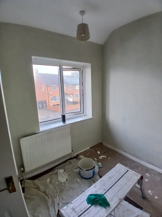A room during preparation and decorating.